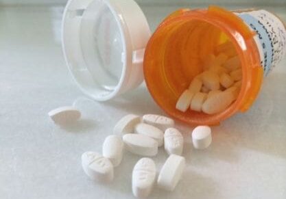 A close up of pills in a container